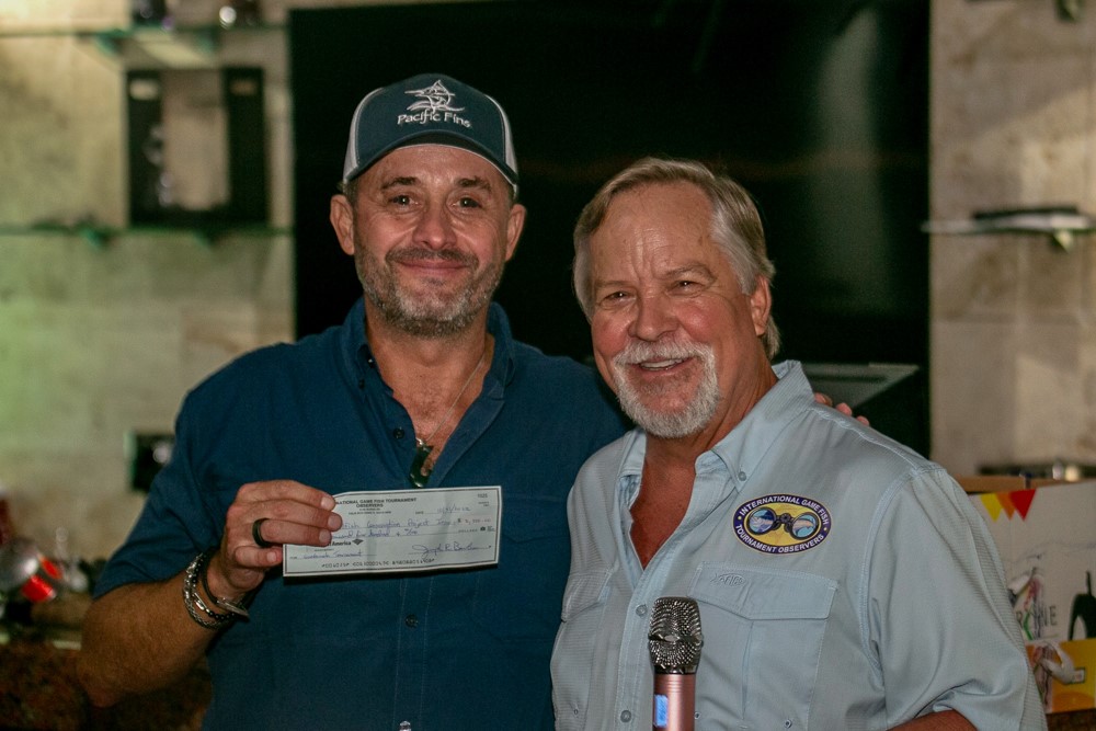 Steve Hargett, IGFTO Presidents presents donation for the Guatemala 7th Annual Billfish Invitational